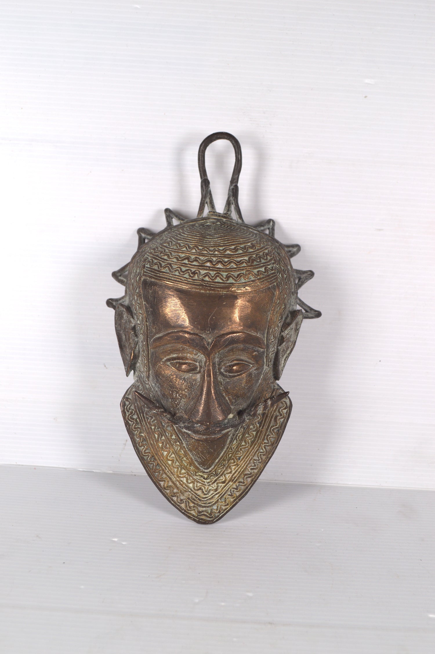 masque-africain-en-bronze